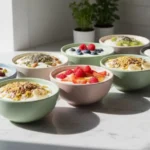 Benefits of eating yogurt everyday shown in a flat lay with fruit, nuts, and seeds for gut health and energy support