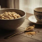 Classic oatmeal bowl with ground flaxseed on a rustic table, showing how to eat flaxseed daily the simple way